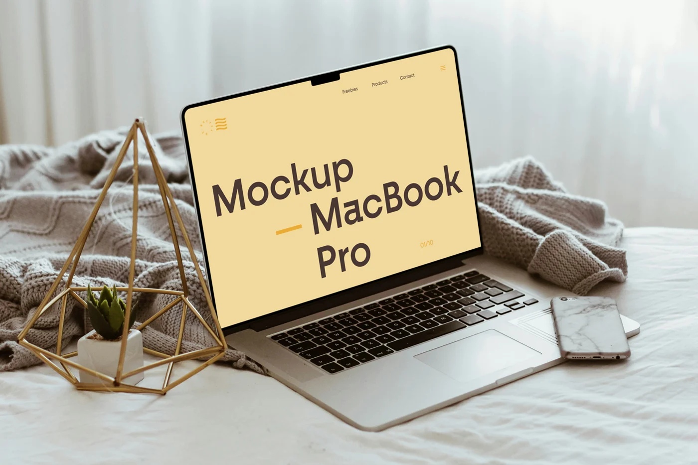 MacBook Pro Lying On Bed Mockup