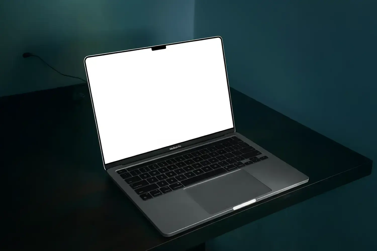MacBook Pro On Black Table Mockup